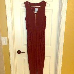 Never worn burgundy jumpsuit.
